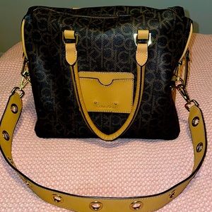 Brown Calvin Klein signature bag.